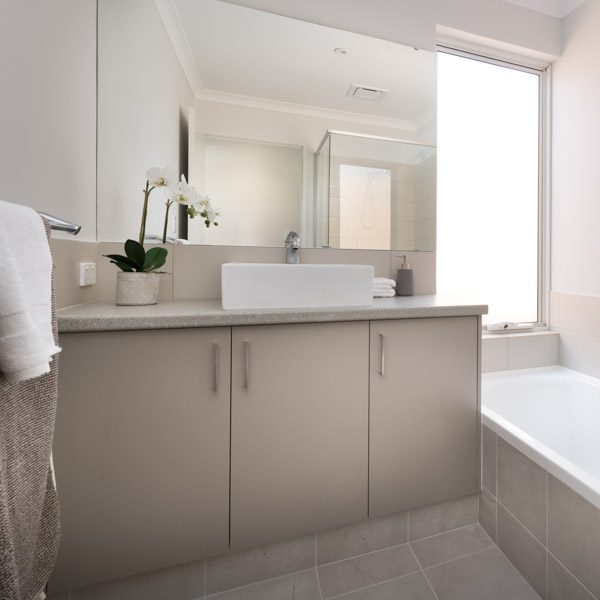Cabinetry in bathroom by Move Homes in a Baye colour
