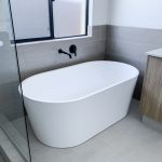 brand new bathroom with a free standing tub