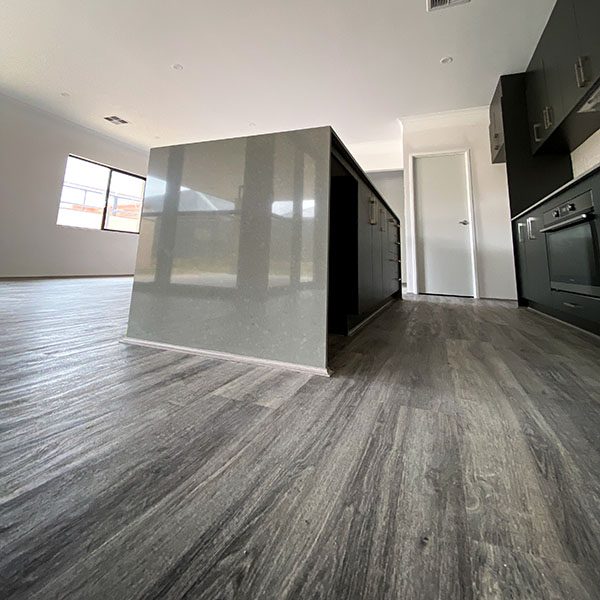 The Grey hybrid planks in the Vtech series in a new house by Move Homes