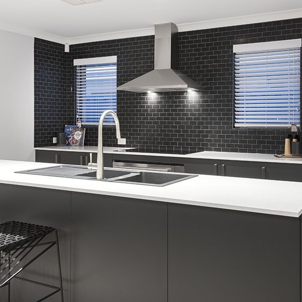 The black Kensington Nero splashback tiles in a new home in South Guildford