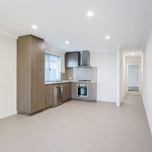 The kitchenette in an intergenerational home for grandparents, teenagers or in-laws