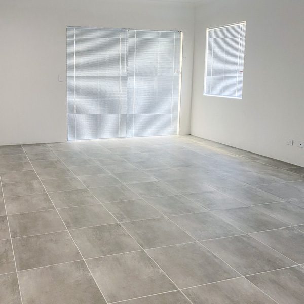 Belga Grey floor tiles in a brand new living area by Move Homes