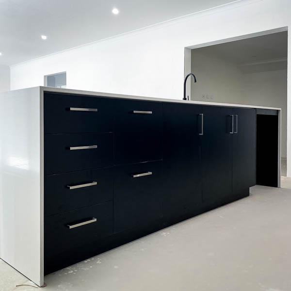 Black cabinets in a new Perth home's kitchen
