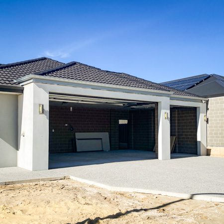 A triple garage in a new Move Homes
